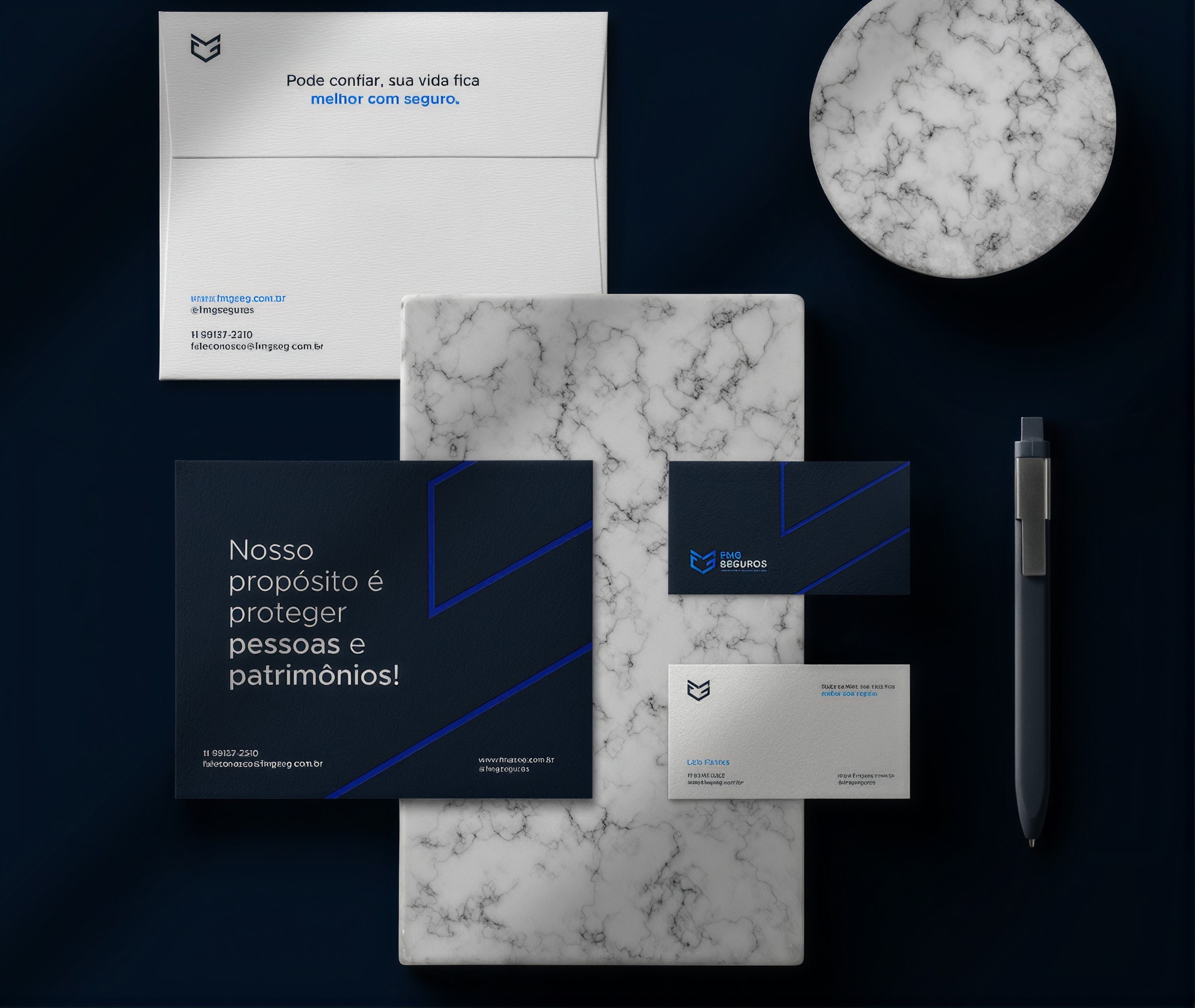 Papelaria da FMG Seguros: envelope, flyer e cartões de visita
